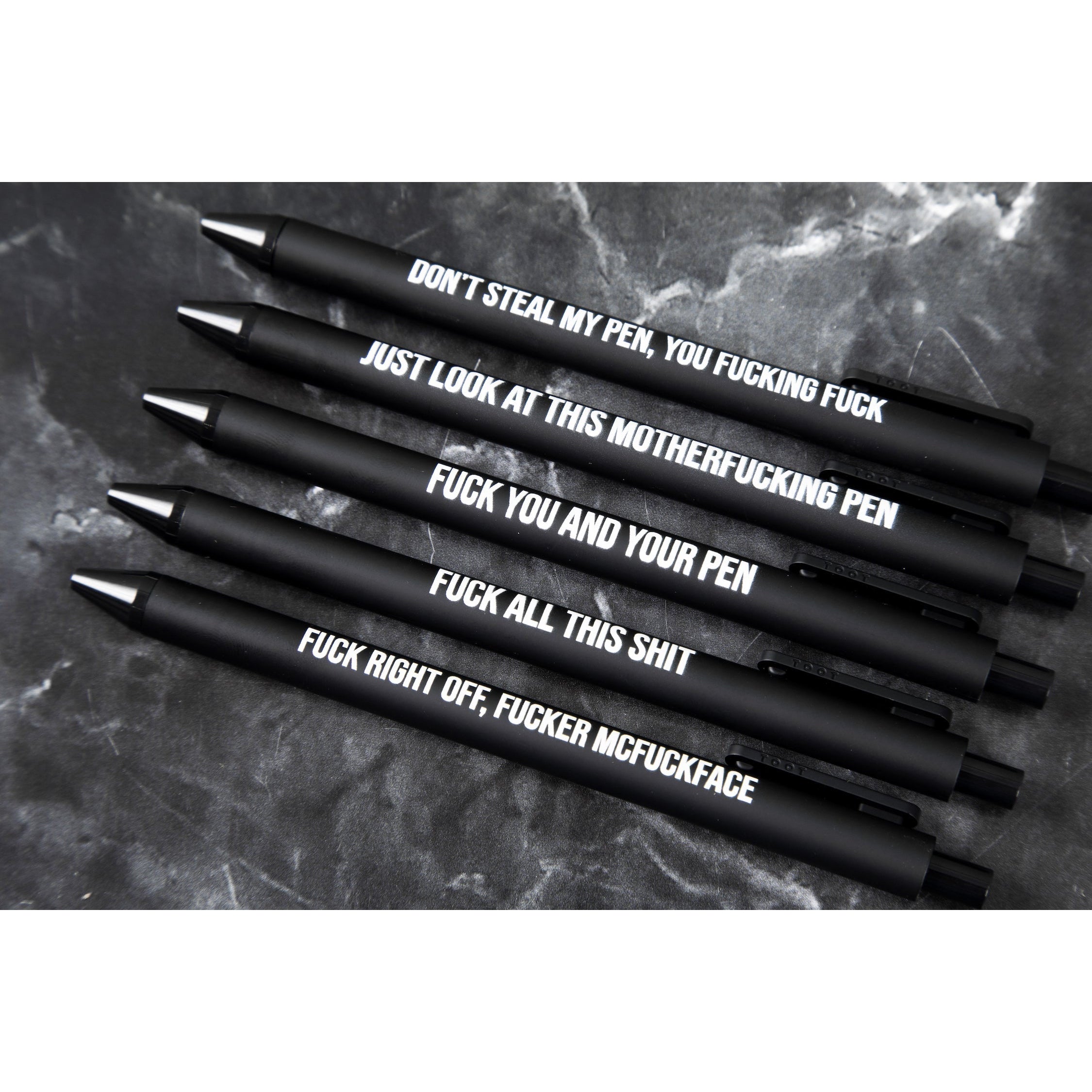 https://www.quirkycrate.com/cdn/shop/products/Sweary-Fuck-Pens-Cussing-Pen-Gift-Set-5-Black-Gel-Pens-Rife-with-Profanity-3.jpg?v=1684023441